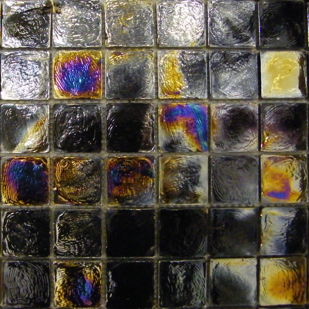 Black lustre glass mosaic sheet 300mm x 300mm.Comprised of 48mm x 48mm squares.£6.99 per sheet including VAT.